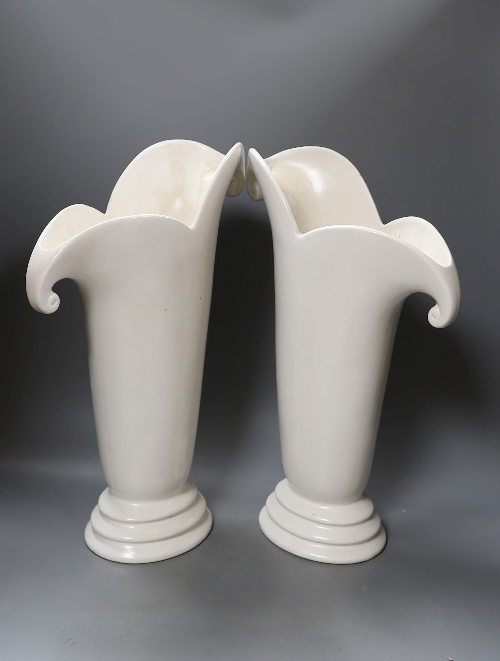 A large pair of Art Deco pottery vases, 41cm